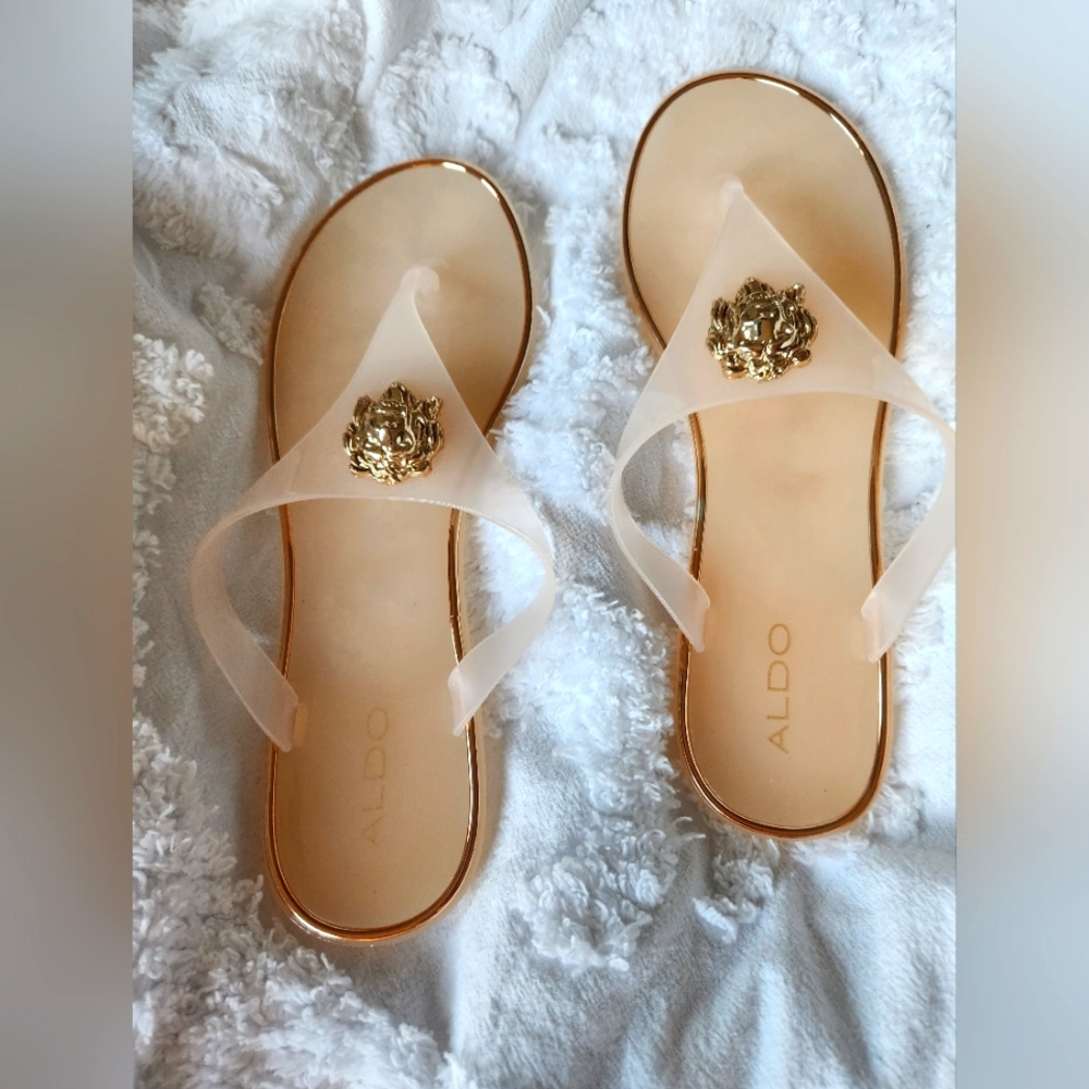 New/never worn Aldo gold lioness peach/beige thong sandals.